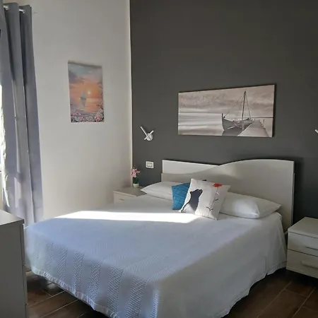 Nelle Favole, E Prázdninový dům